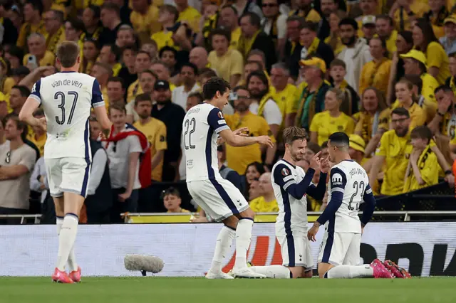 James Maddison of Tottenham Hotspur celebrates scoring his team's second goal with teammate Pedro Porro during the UEFA Europa League 2024/25 Semi Final First Leg match between Tottenham Hotspur and FK Bodo/Glimt at Tottenham Hotspur Stadium on May 01, 2025