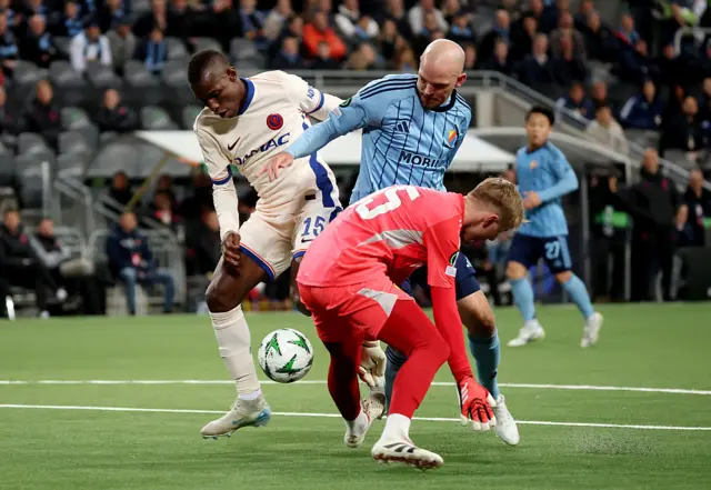 Nicolas Jackson of Chelsea scores his team's third goal past Jacob Rinne of Djurgarden during the UEFA Conference League 2024/25 Semi Final First Leg match between Djurgarden and Chelsea FC at Stockholm Arena on May 01, 2025 in Stockholm, Sweden.