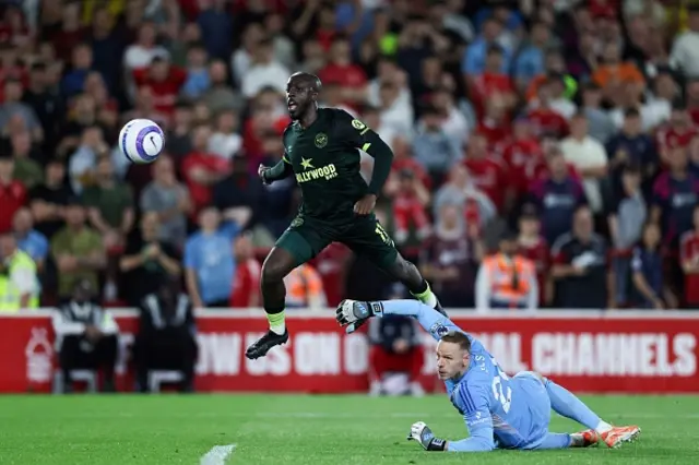 Yoane Wissa (L) scores