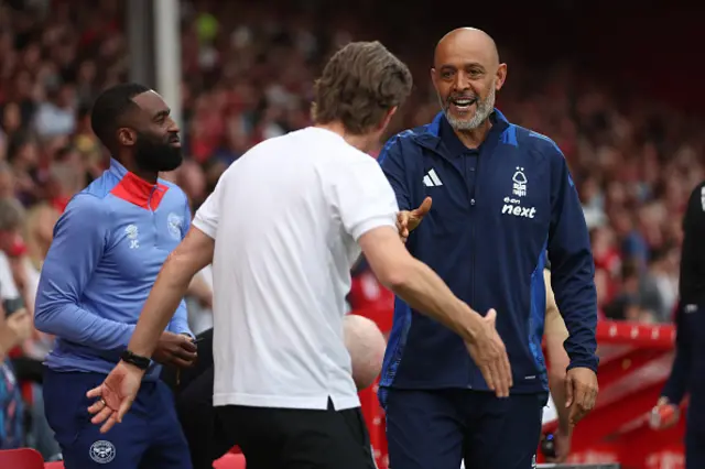 Thomas Frank, manager of Brentford, shakes hands with Nuno Espirito Santo