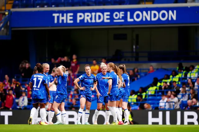 Chelsea players dejected after losing to Barcelona