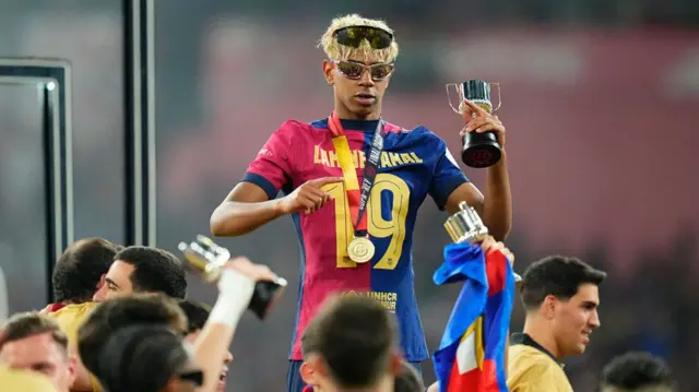 Lamine Yamal celebrates after Copa del Rey win