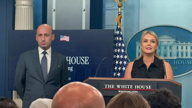 Karoline Leavitt and Stephen Miller giving a White House briefing.