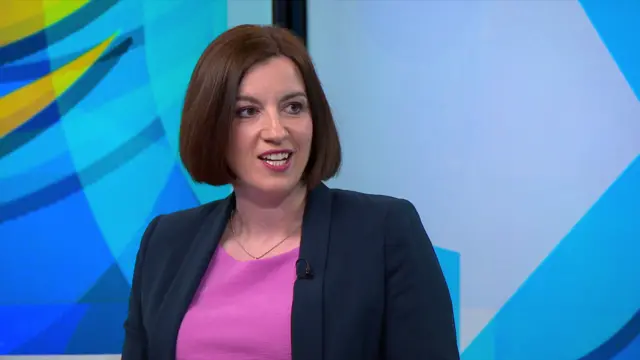 Phillipson, wearing a pink top under a navy blazer, speaks on Newsnight