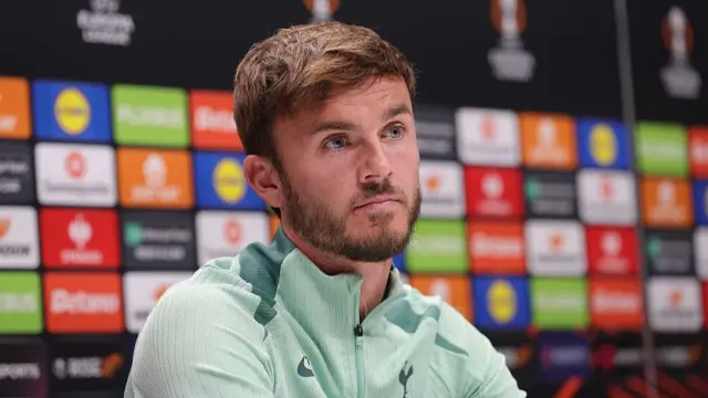 James Maddison of Tottenham Hotspur during a press conference ahead of their UEFA Europe League 2024/25 semi final first leg match at Tottenham Hotspur Training Ground on April 30, 2025 in Enfield, England.