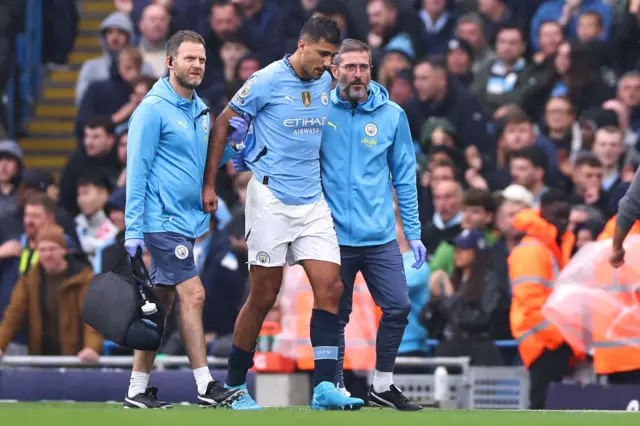 Rodri goes off injured