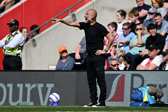 Pep Guardiola, Manager of Manchester City, gestures