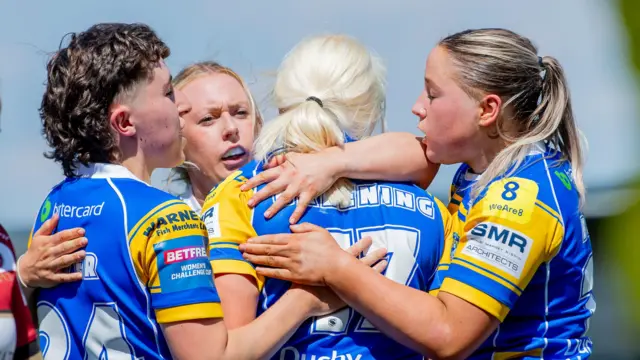 Leeds celebrate Jenna Greening's try against Wigan