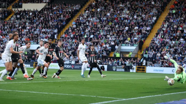Alex Bass makes a save