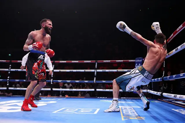 Cacace knocks down Wood