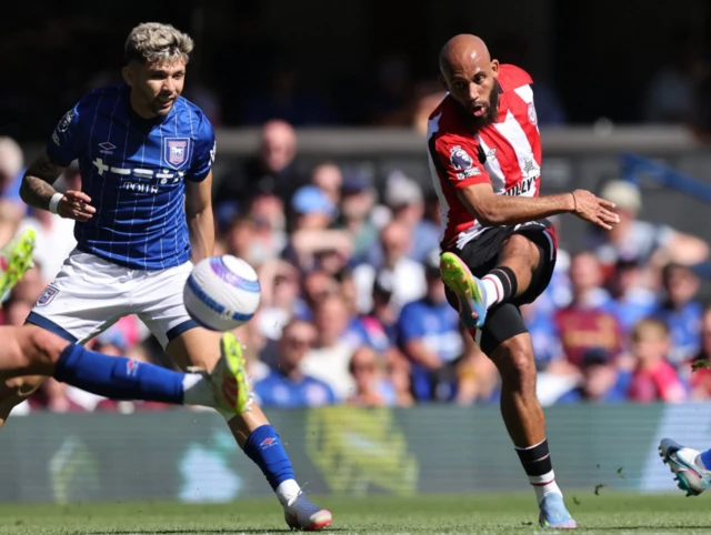 Brentford's Bryan Mbeumo shoots at goal