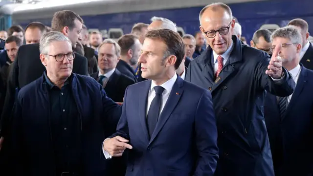 Starmer, Macron and Merz at Kyiv railway station.