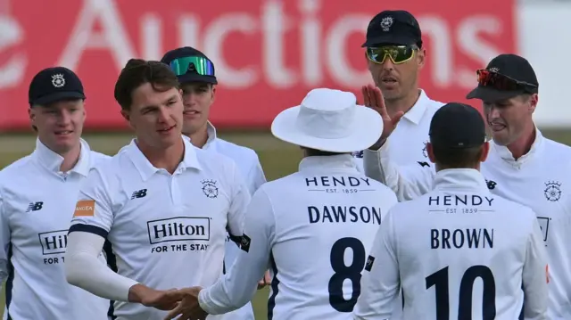 Sonny Baker takes a wicket