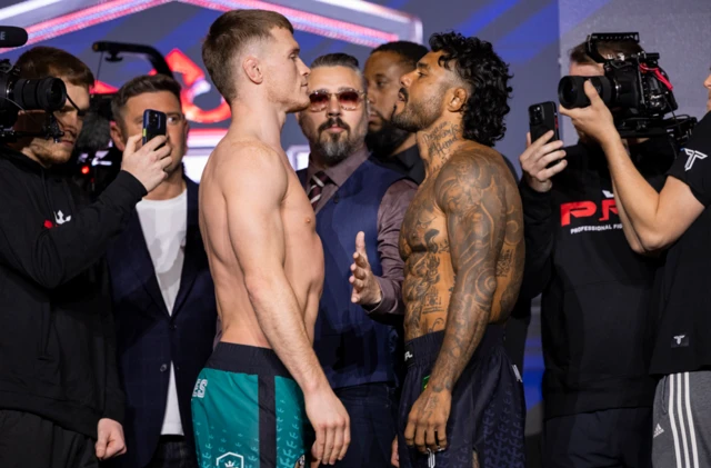 Paul Hughes faces off with Bruno Miranda at a weigh-in