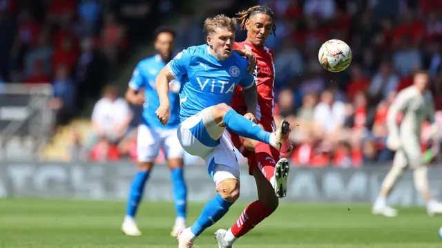 Will Collar of Stockport County competes for the ball with Sean Clare of Leyton Orient