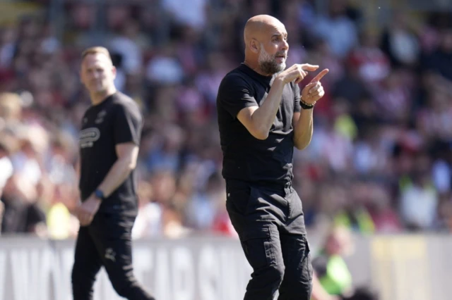 Manchester City manager Pep Guardiola on the touchline