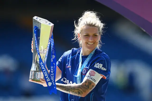 Millie Bright celebrates.