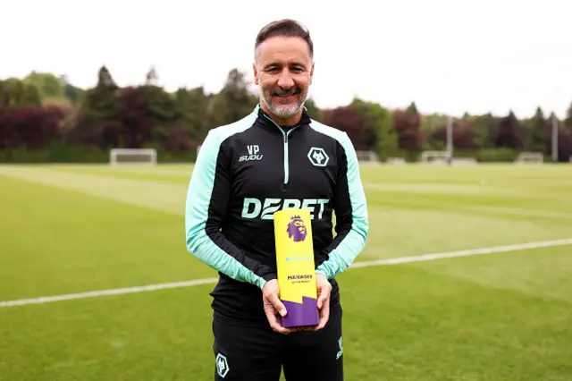 Vitor Pereira poses with manager of the month trophy