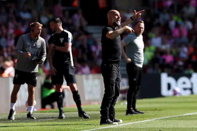 Pep Guardiola, Manager of Manchester City, gestures