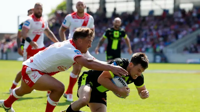Luke Keary scores his try for Catalans against Hull KR