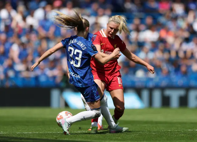 Chelsea's Agnes Beever-Jones in action with Liverpool's Sophie Roman Hau
