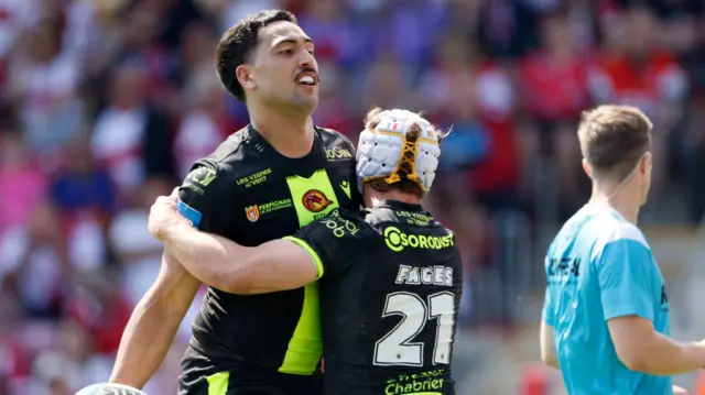 Catalans celebrate Reimis Smith's try