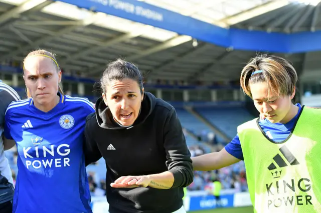Amandine Miquel addresses her players at full time