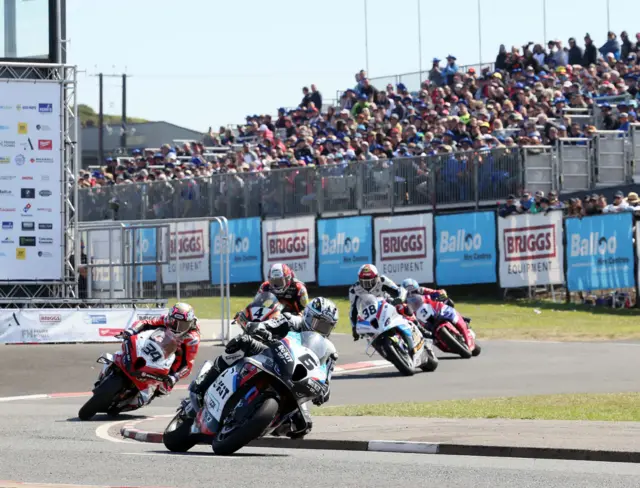 Michael Dunlop leads a group of riders