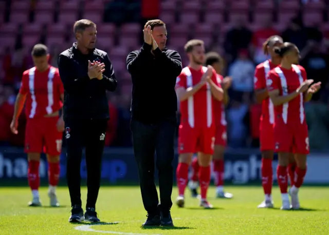 Leyton Orient manager Richie Wellens acknowledges the crowd
