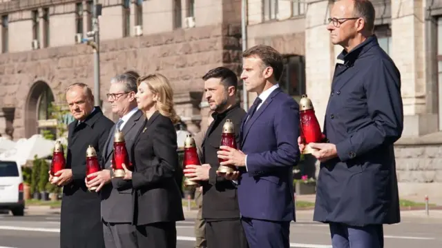 German Chancellor Friedrich Merz, French President Emanuel Macron, Ukrainian President Volodymyr Zelenskiy and his wife Olena Zelenska, Britain's Prime Minister Keir Starmer, and Poland's Prime Minister Donald Tusk visit Independence Square