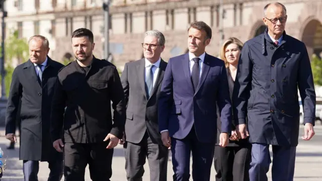 German Chancellor Friedrich Merz, French President Emanuel Macron, Ukrainian President Volodymyr Zelenskiy and his wife Olena Zelenska, Britain's Prime Minister Keir Starmer, and Poland's Prime Minister Donald Tusk visit Maidan Square