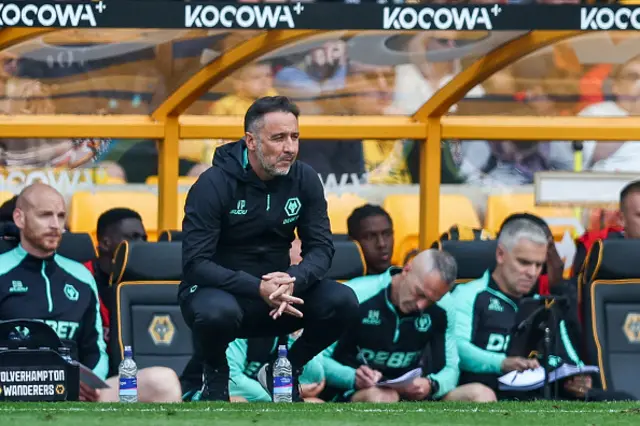 Vitor Pereira, manager of Wolverhampton Wanderers squats
