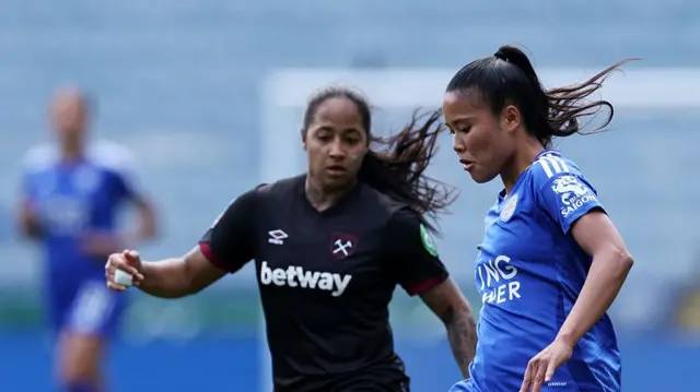Asmita Ale of Leicester City holds off Manuela Pavi of West Ham United during the Barclays Women's Super League match between Leicester FC and West Ham United FC at The King Power Stadium on May 10, 2025 in Leicester, England.