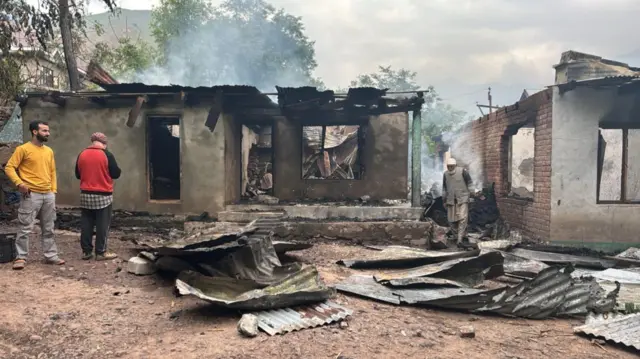 A burned out home on the streets of Uri.