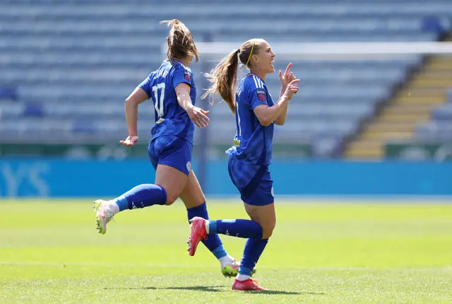 Janice Cayman celebrates