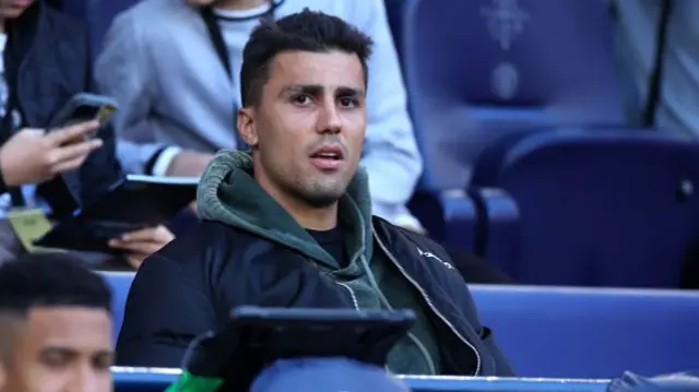 Rodri of Manchester City looks on