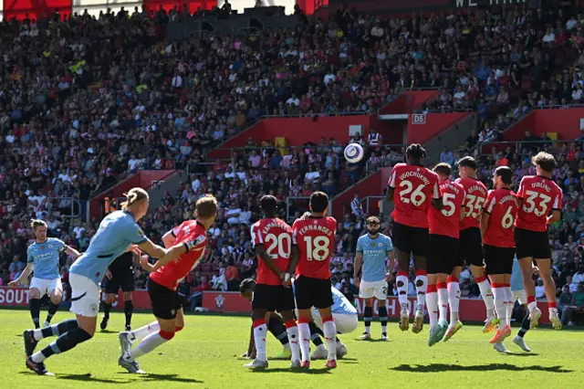 Kevin De Bruyne (L) misses with this freekick