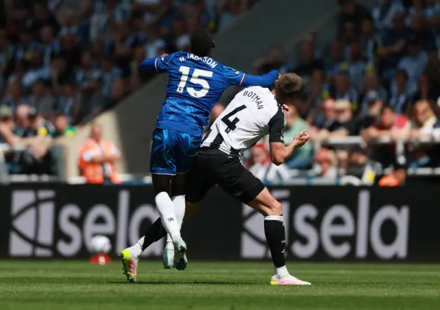 Chelsea's Nicolas Jackson fouls Newcastle United's Sven Botman before being shown a red card after a VAR review