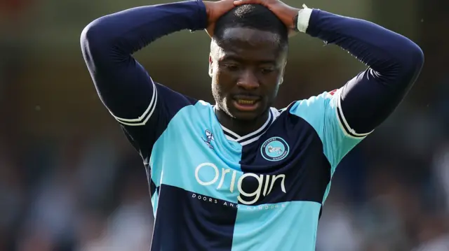 Daniel Udoh looks dejected