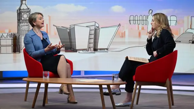 Kuenssberg challenges Cooper while they are seated in the Sunday with Laura K studio.