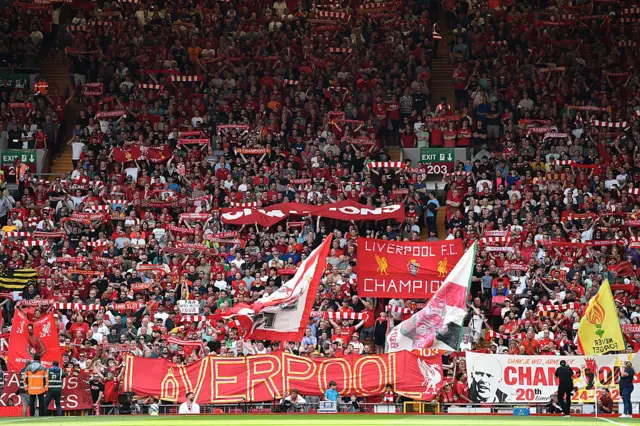Liverpool fans sing ahead of kick-off in the English Premier League football match between Liverpool and Arsenal at Anfield i