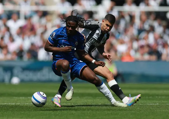 Chelsea's Romeo Lavia in action with Newcastle United's Bruno Guimaraes
