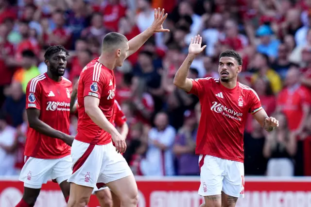 Nottingham Forest's Morgan Gibbs-White (right) celebrates with his team mates