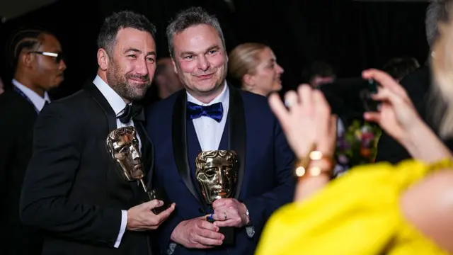 Blue Lights creators  Adam Patterson and Declan Lawn pose for a pic with their best drama series award