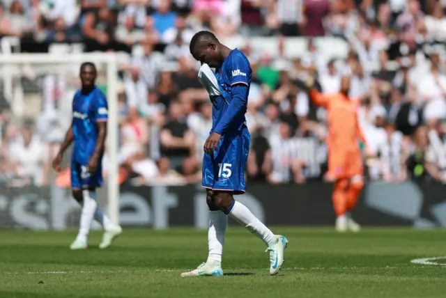 Chelsea's Nicolas Jackson walks off the pitch after being shown a red card