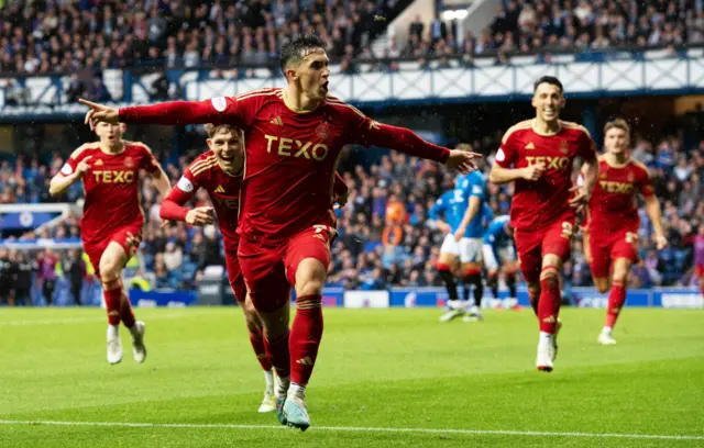 Jamie McGrath celebrates making it 2-0 to Aberdeen at Ibrox