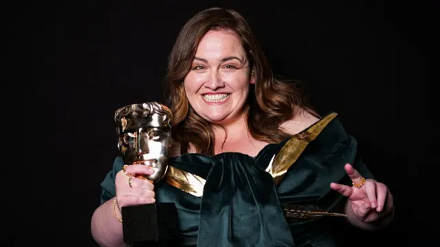 Jessica Gunning holding her Bafta
