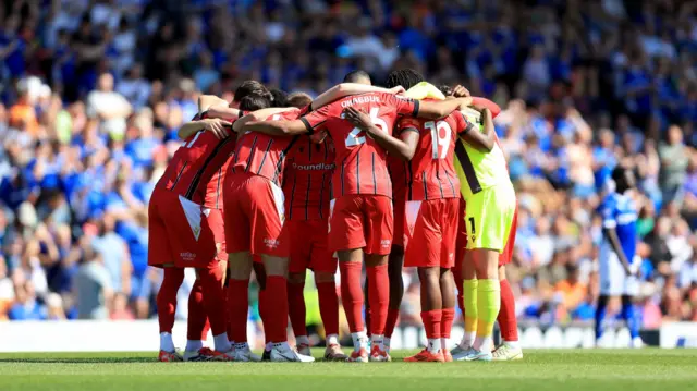 Walsall players huddle