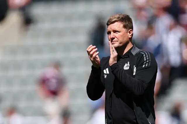 Eddie Howe the head coach / manager of Newcastle United applauds the fans