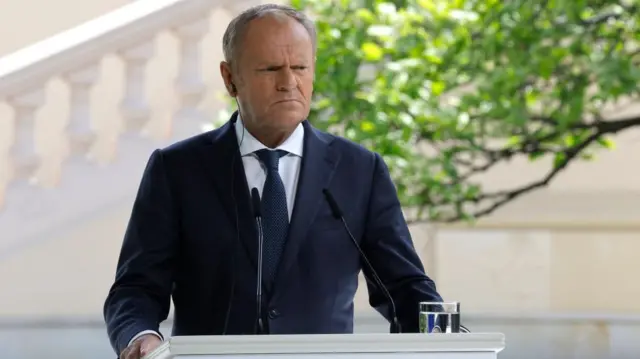 Poland's Prime Minister Donald Tusk attends a joint press conference following a meeting of the 'Coalition of the willing'